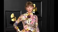 Taylor Swift thanks fans as Simone Biles presents her with Gracie Award