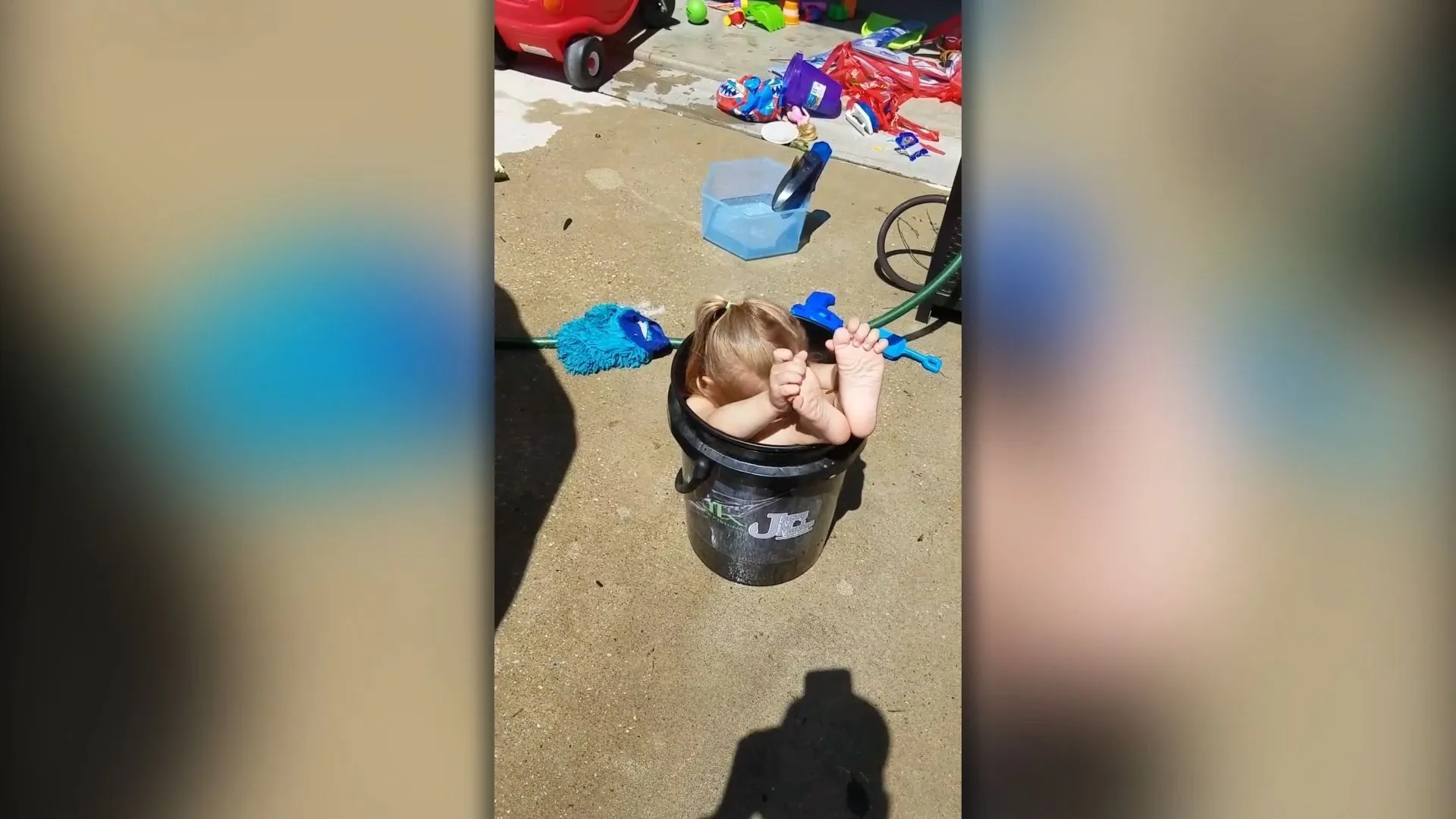 Father notices daughter stuck in bucket
