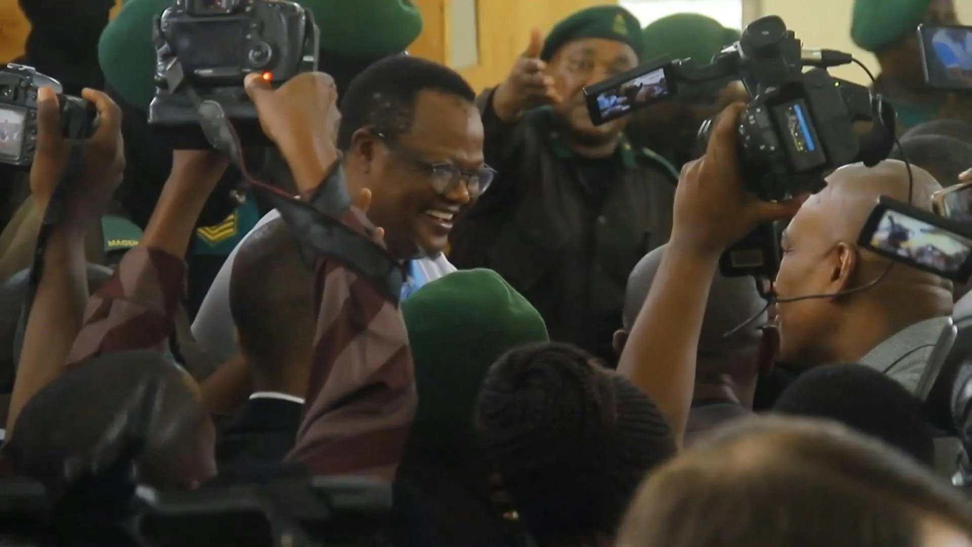 Tanzania opposition leader defiant as he appears for treason trial