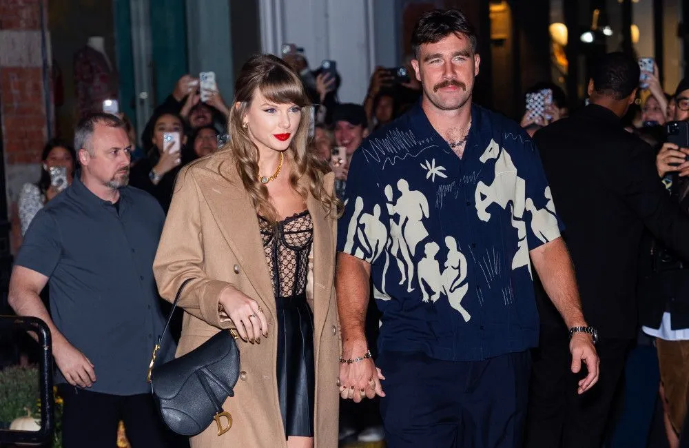 Travis Kelce says he and Taylor Swift are 'just two people in love'