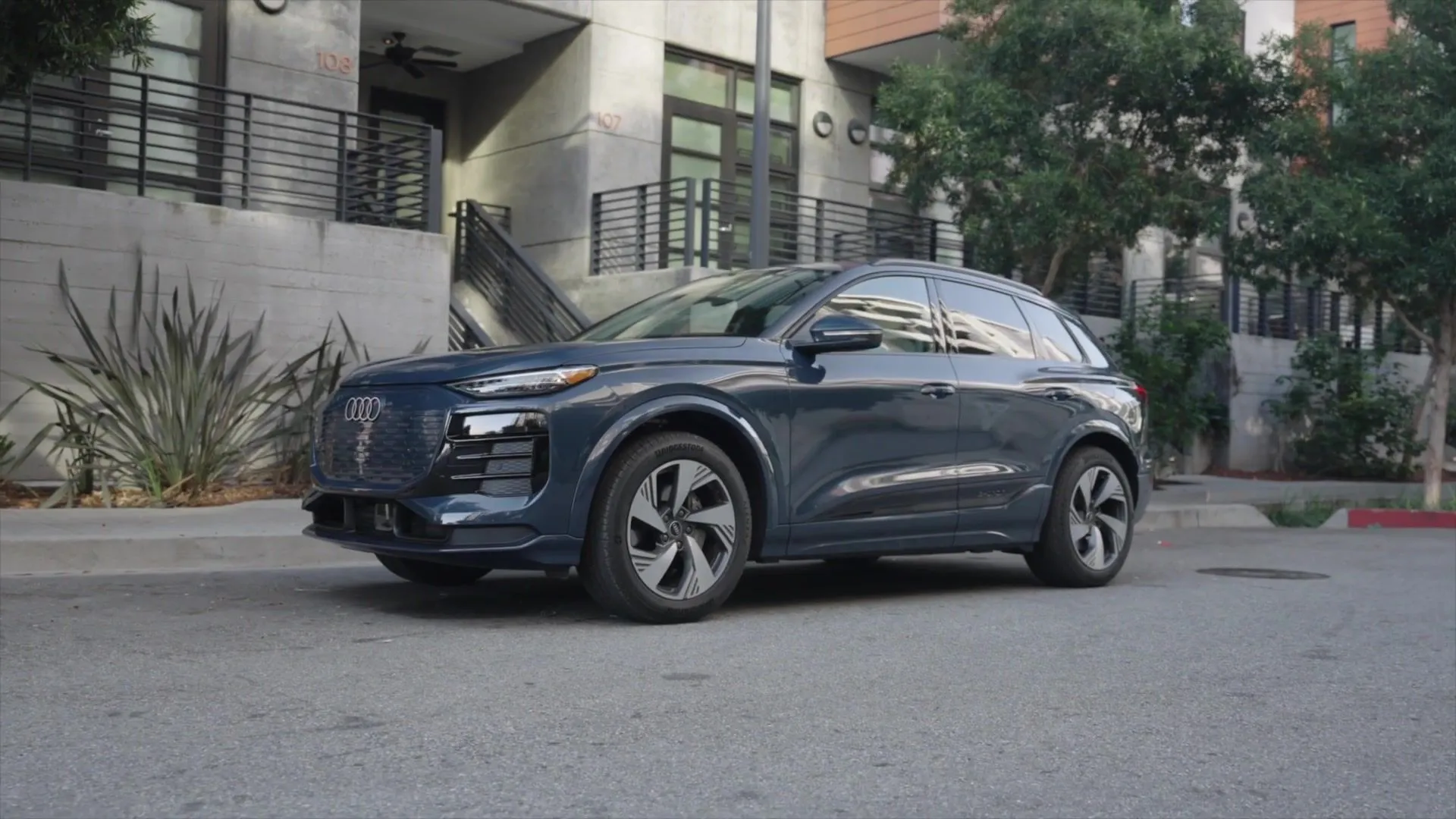 2025 Audi Q6 e-tron Design Preview in Plasma Blue