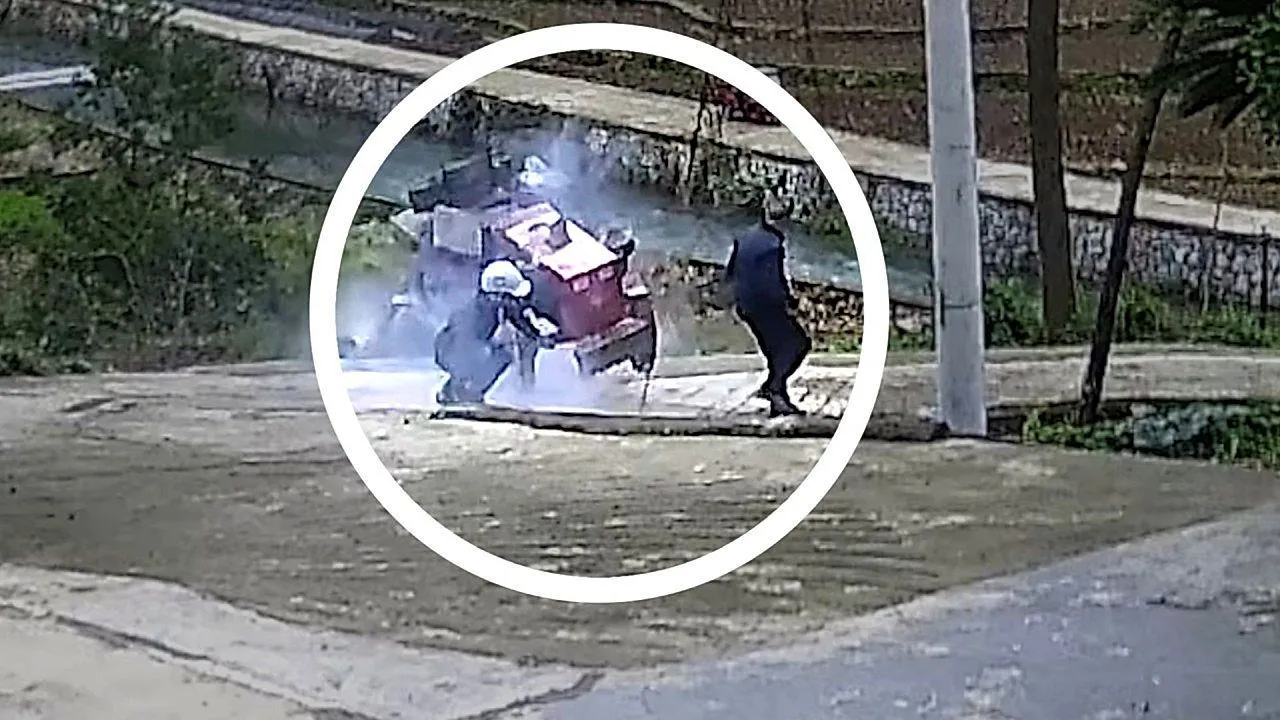 Epic fail! Hapless workers send tractor tumbling down hill in China