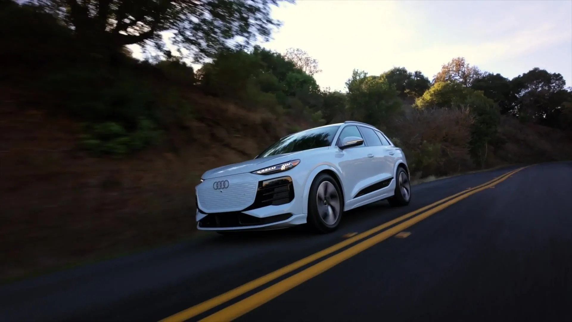 2025 Audi Q6 e-tron in Glacier White Driving Video