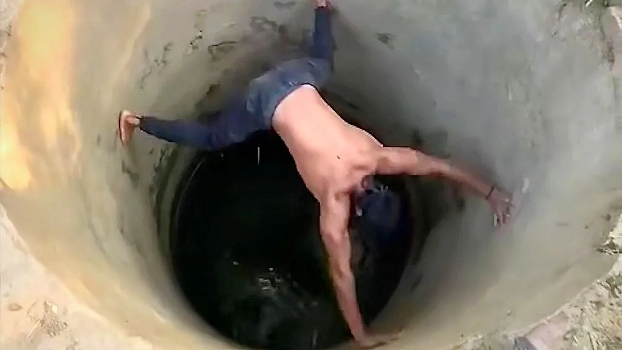 Manns kühner Brunnenkletterer lässt Zuschauer sprachlos zurück