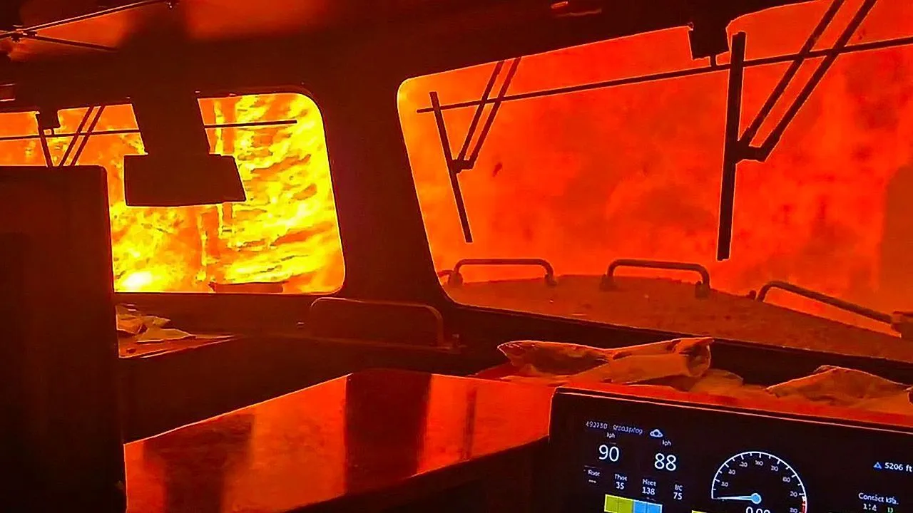 Dramatic moment Canadian freight train surrounded by wildfire in Ontario