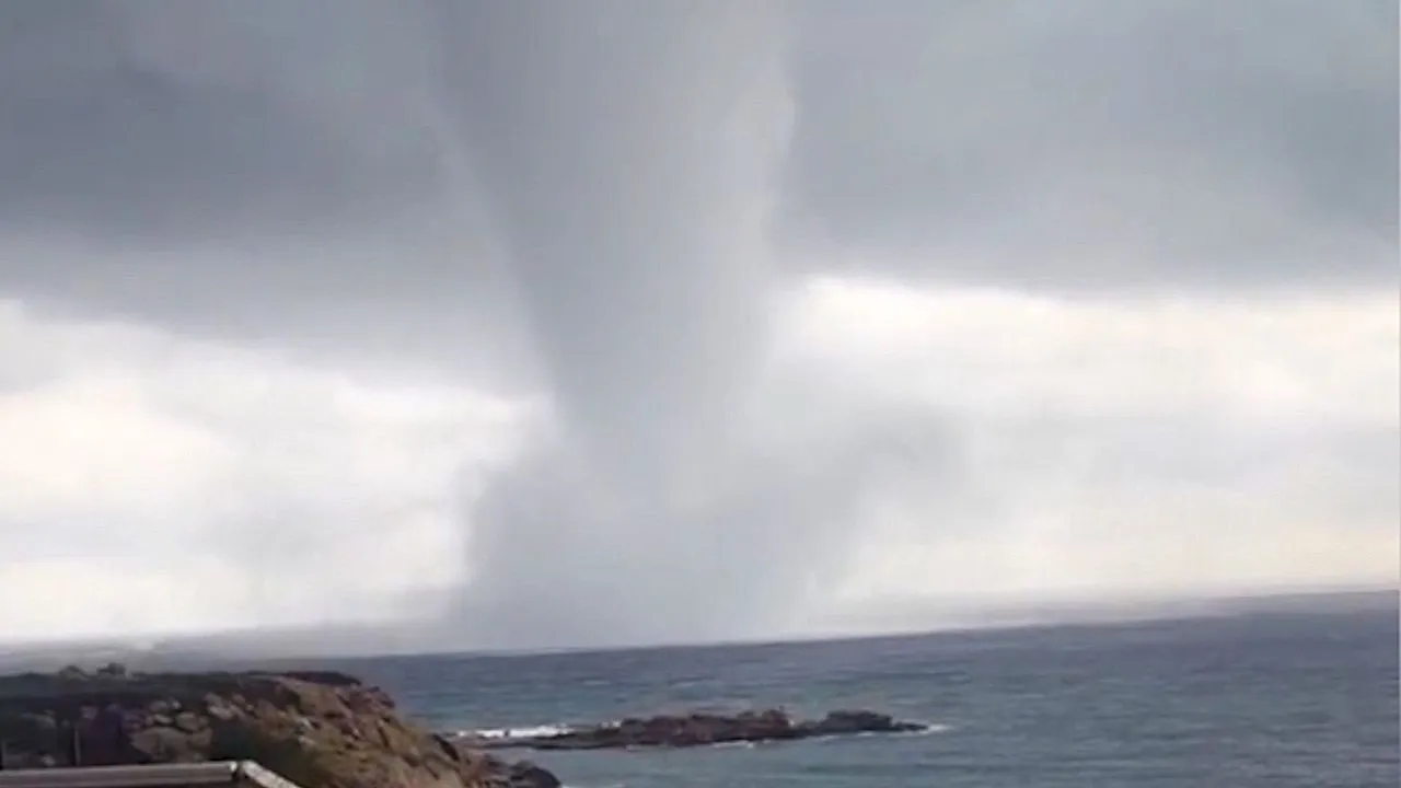 Huge waterspout forms off Rhodes island as storms batter Greece