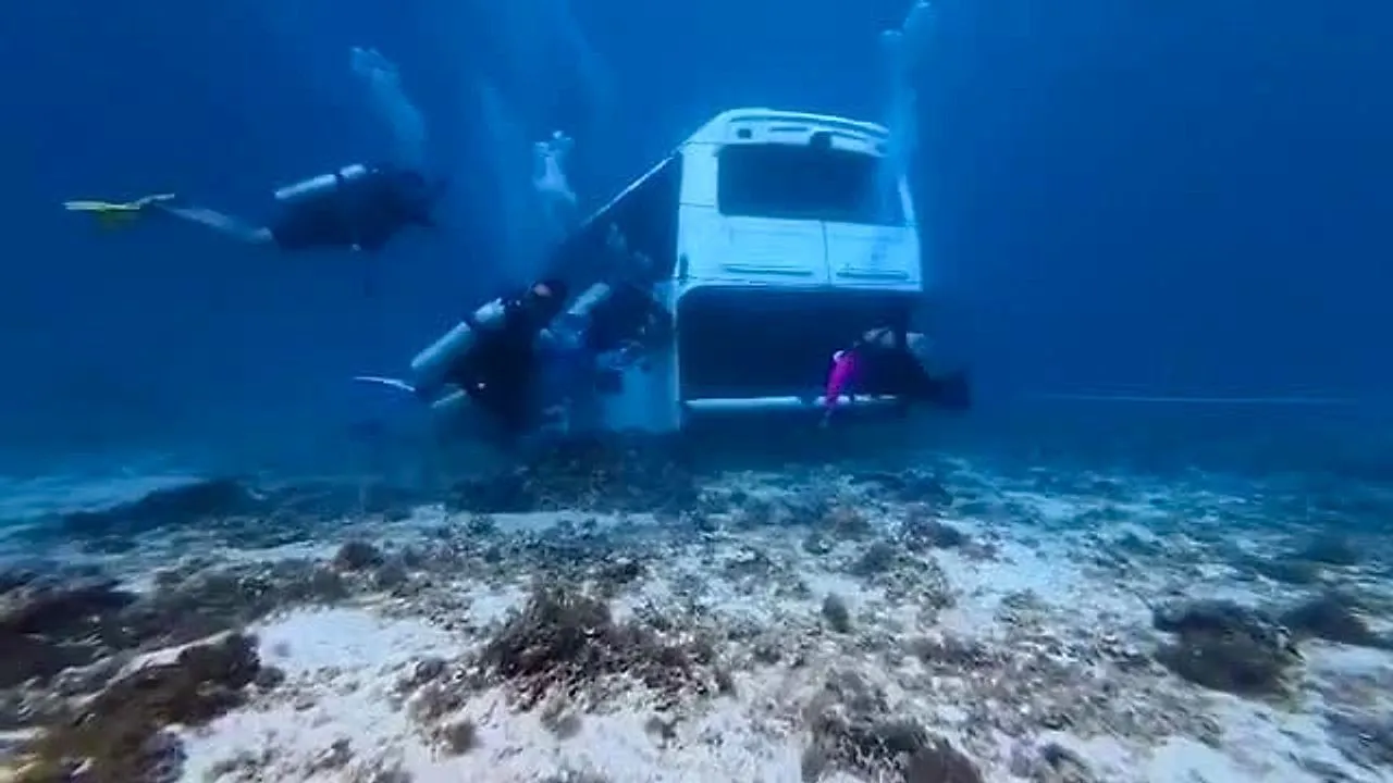 Old school bus sunk to create artificial reef off Philippine island