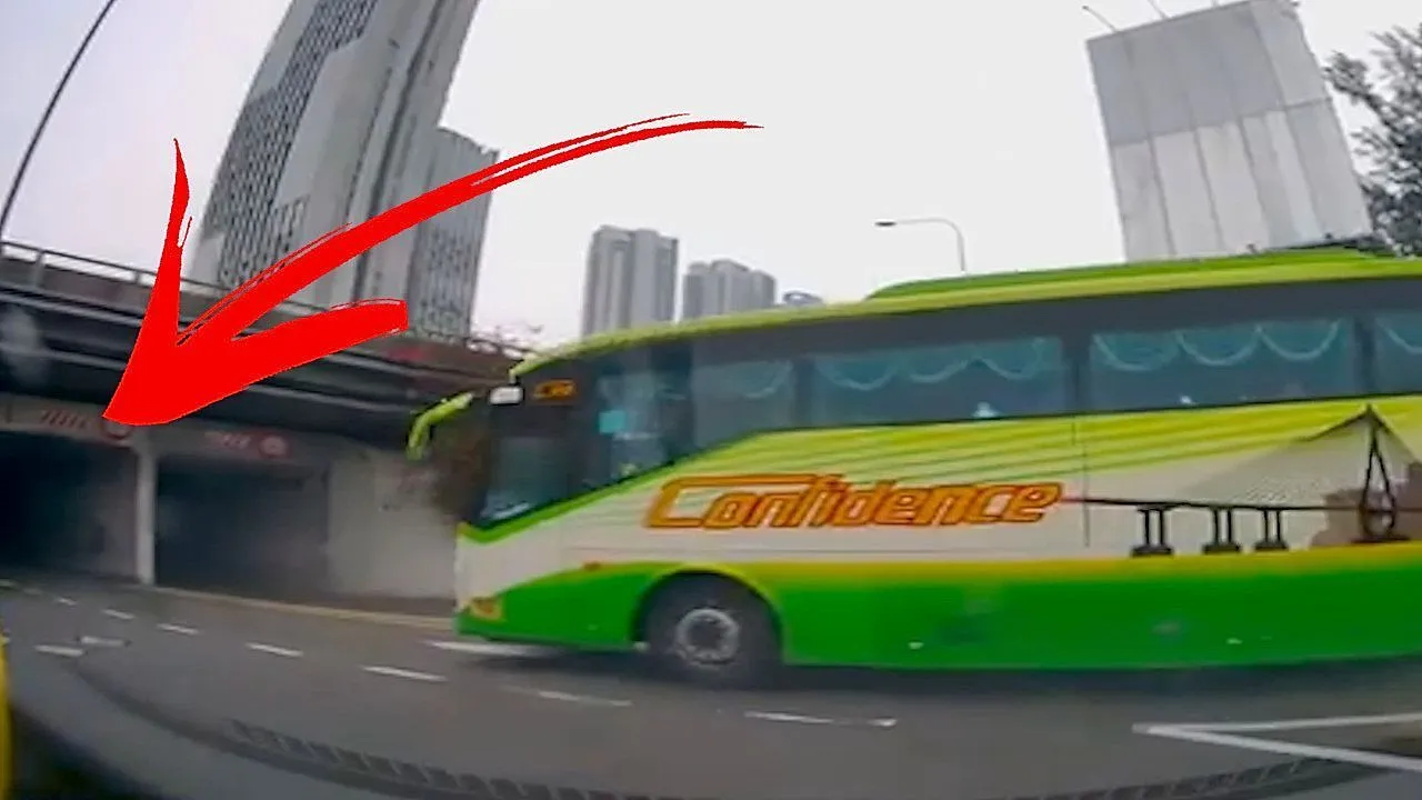 Bus driver misjudges bridge height and smashes into underpass